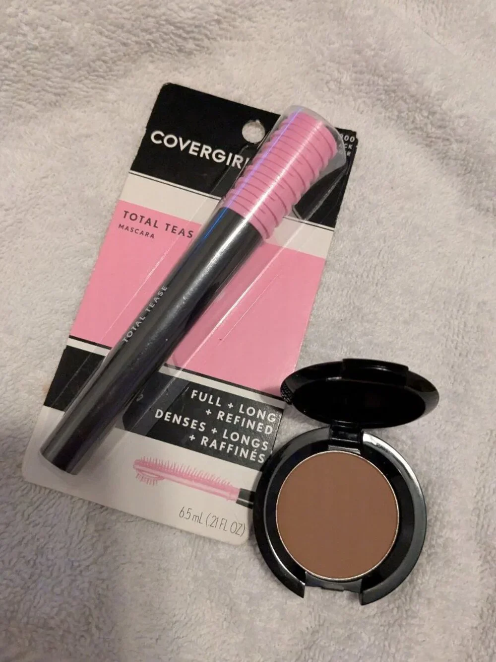 Covergirl very black mascara with V-Kosmetix translucent powder in cool neutral